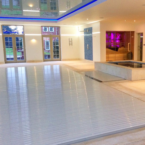 swimming pool completed by Marshall Swimming Pools indoor glitter ceiling and pool covering